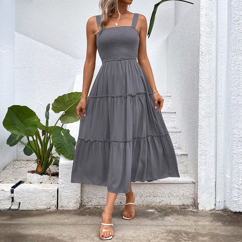 Pulling straps and sleeveless dress