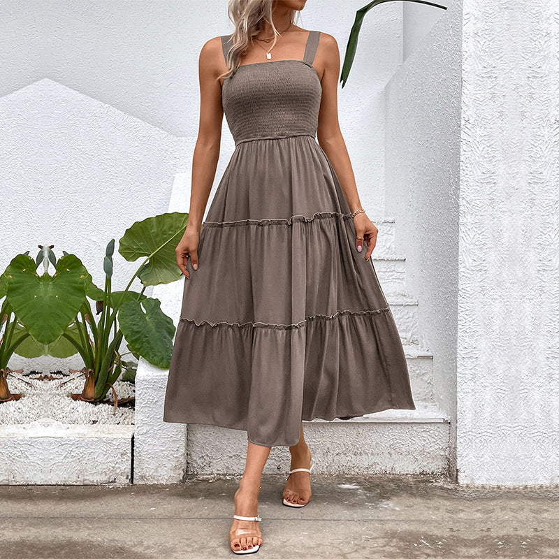 Pulling straps and sleeveless dress