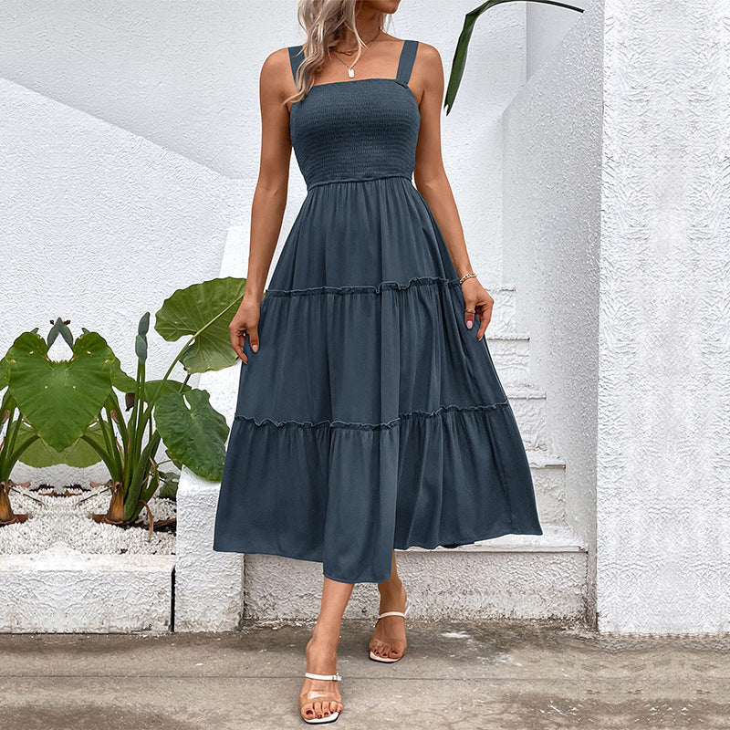 Pulling straps and sleeveless dress