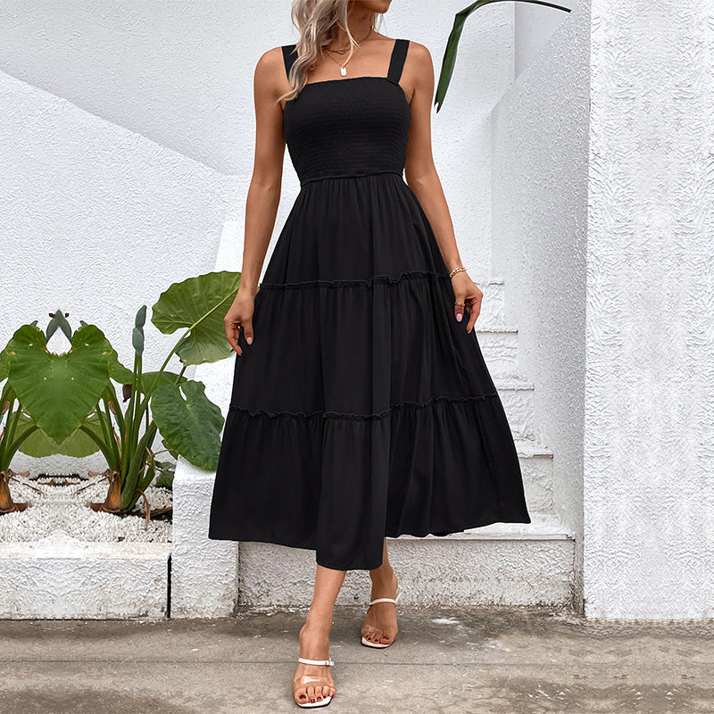 Pulling straps and sleeveless dress